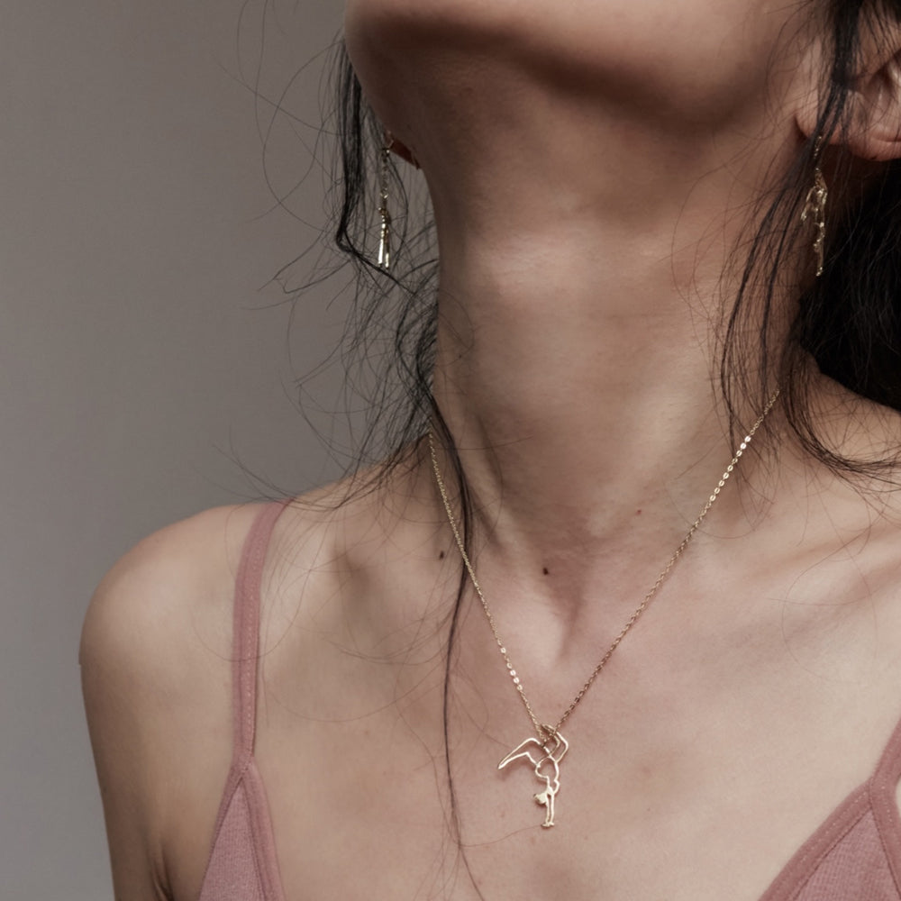 Embrace Fearlessness and Strength. Bold Balance: Handstand Necklace